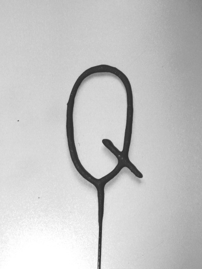 prskavka písmeno Q